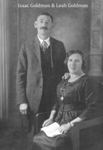 A man and woman pose for the camera.