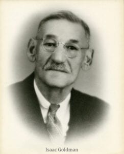 A black and white photo of an older man.