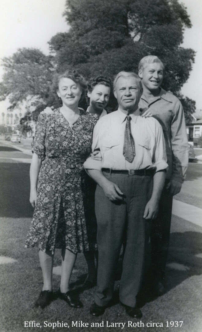 A black and white photo of two men, one older than the other.