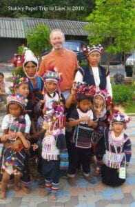 A group of people in native costumes posing for the camera.