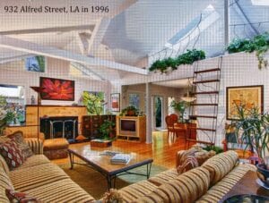 A living room with a couch and fireplace