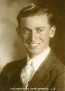 A young man in a suit and tie.