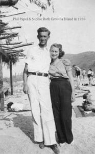 A man and woman standing next to each other.